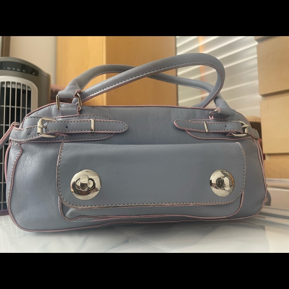 Barney’s baby blue satchel w/ turnlock. Pink lining intact with silver hardware